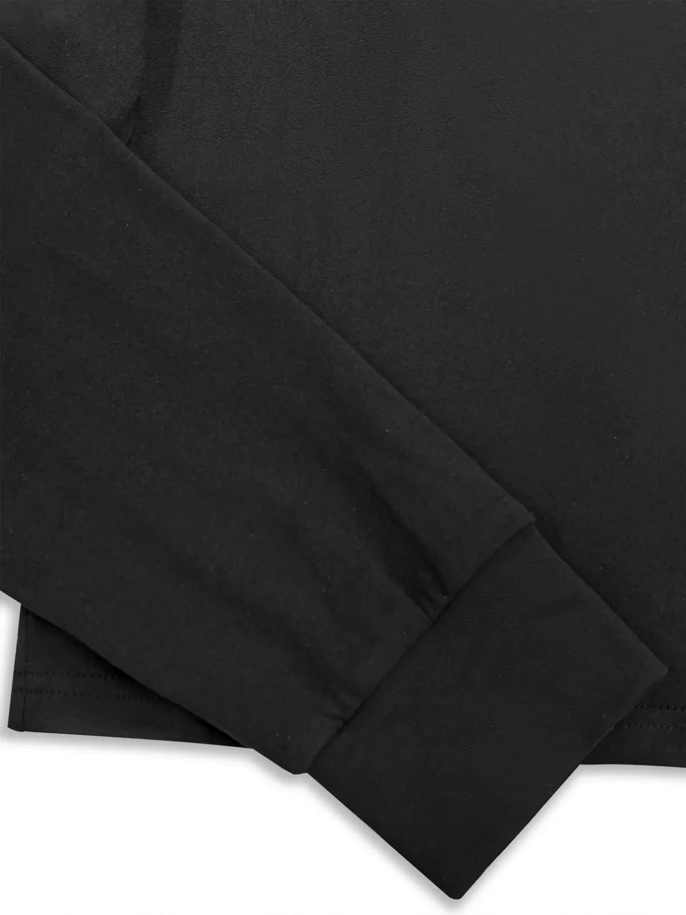 Black long sleeve top with cuffed sleeves, part of a relaxed pajama set.