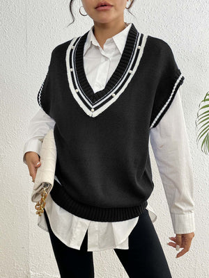 Black acrylic knit vest with varsity stripes and pearl trim on V-neck and sleeves.