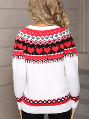 White crew neck sweater with red heart motif and fair isle pattern, acrylic knit.