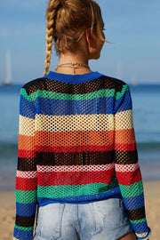 Striped crochet beach cover-up sweater with a blue neckline and long sleeves.