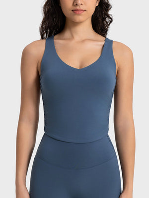 Sculpted ruched tank top in peacock blue with V-neck and athletic fit.