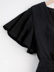 Black flutter sleeve romper with tie waist detail