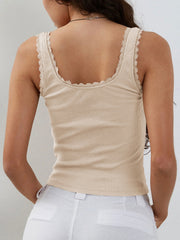 Tan ribbed knit cami with lace trim and bow detail