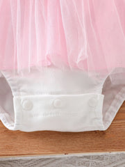 Pink tulle one-piece baby romper with white snap crotch