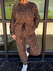 Leopard print loungewear set with drawstring joggers and long sleeve top.