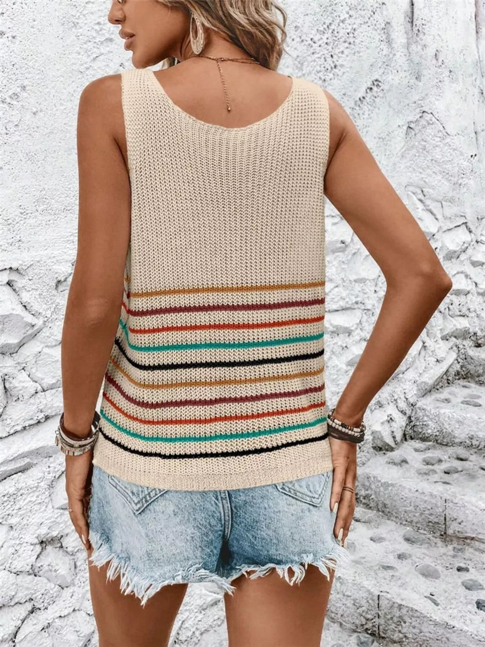 Chic striped V-neck knit vest in beige with colorful horizontal stripes.