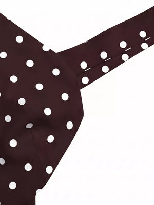 Brown polka dot camisole with tie-back detail.