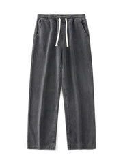 Relaxed wide-leg jeans in dark gray denim with a drawstring waist and pockets.
