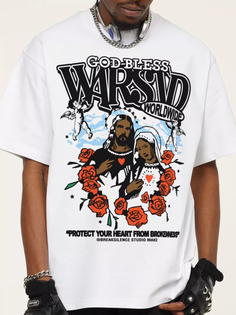 White cotton t-shirt with graphic art of Jesus, Mary, and cherubs surrounded by roses.