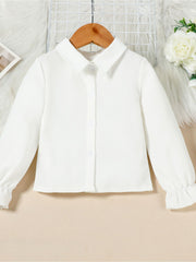 White cotton toddler shirt with button front and flounce cuffs