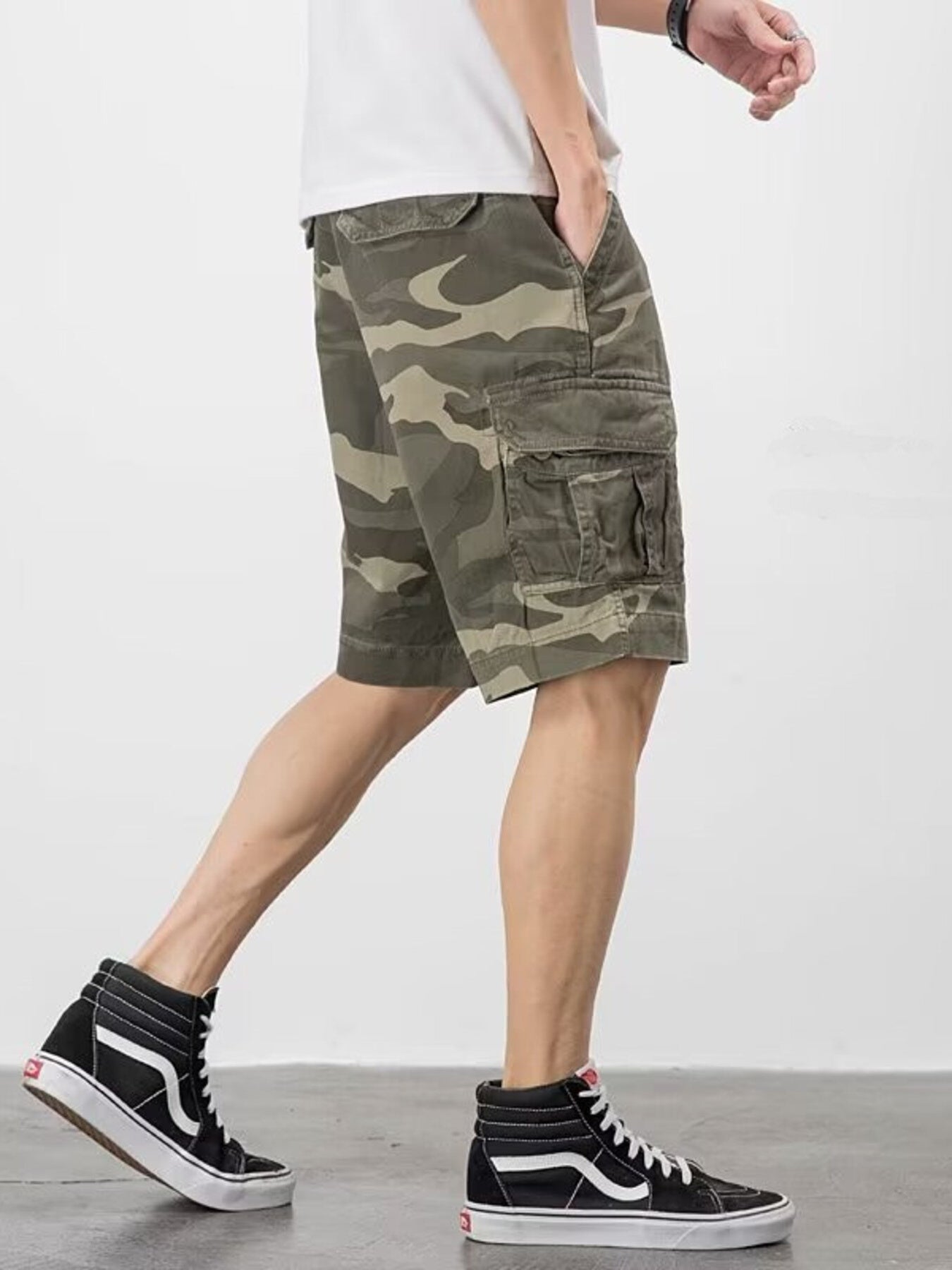 Men's plus-size cargo shorts in camouflage pattern with relaxed fit and multiple pockets.