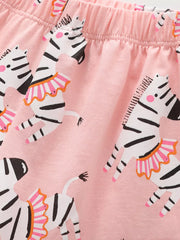 Pink cotton blend toddler shorts with a playful zebra print and elastic waistband.
