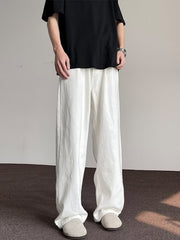Men's white wide-leg jeans with a relaxed fit and casual style.