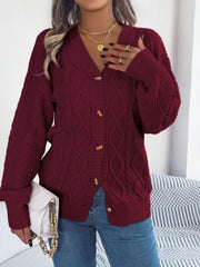Burgundy cable knit cardigan with balloon sleeves and button front.