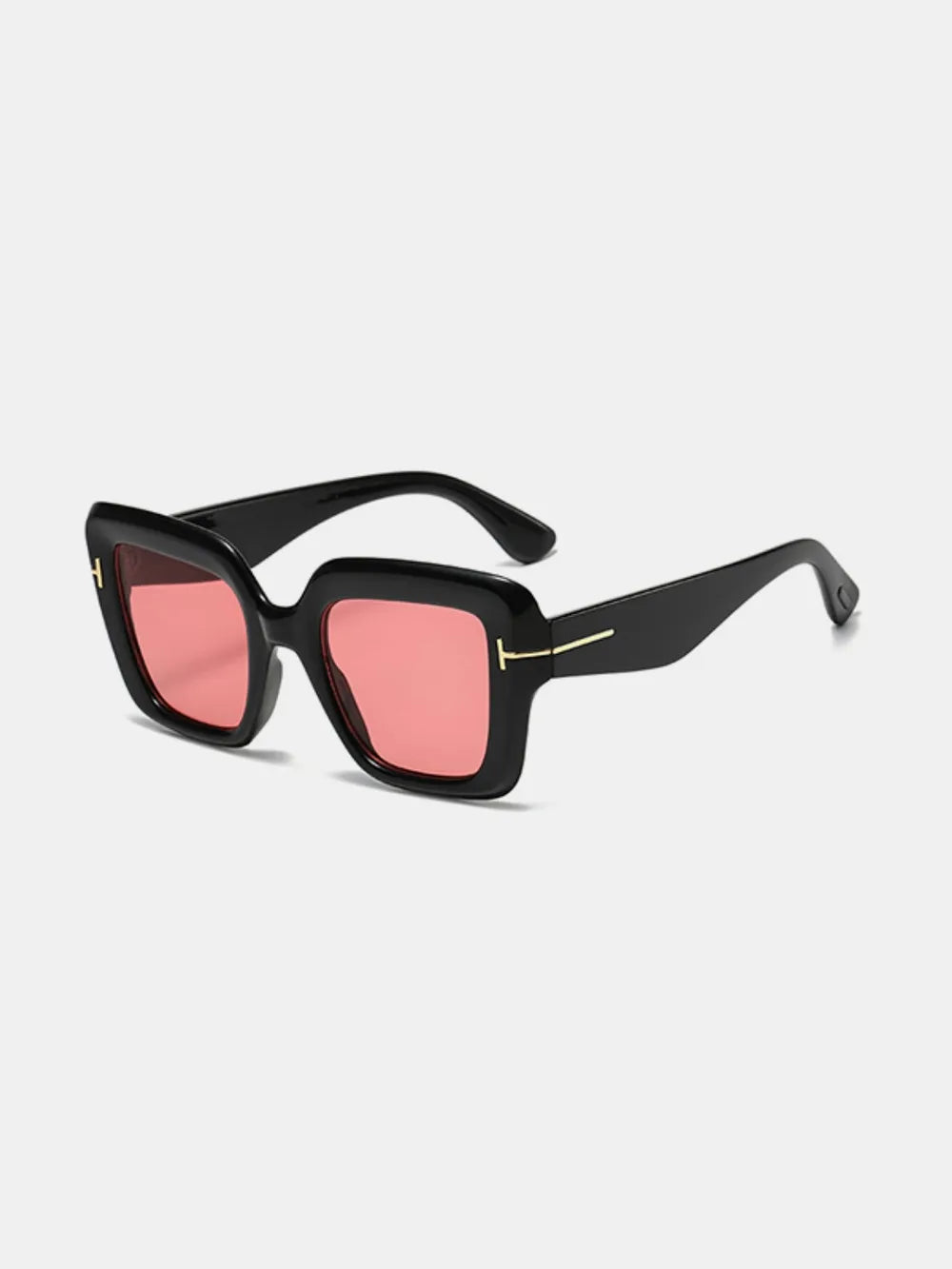 Black geometric acetate sunglasses with pink tinted lenses and gold accents