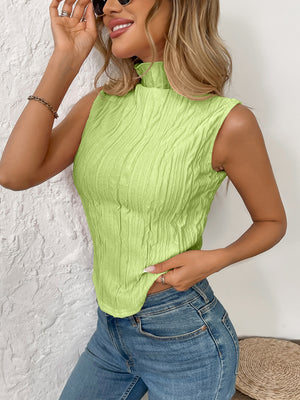 Textured sleeveless mock neck top in lime green with a crinkled pattern.