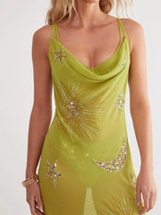 Green sheer cover-up dress with celestial sequin and bead embellishments.