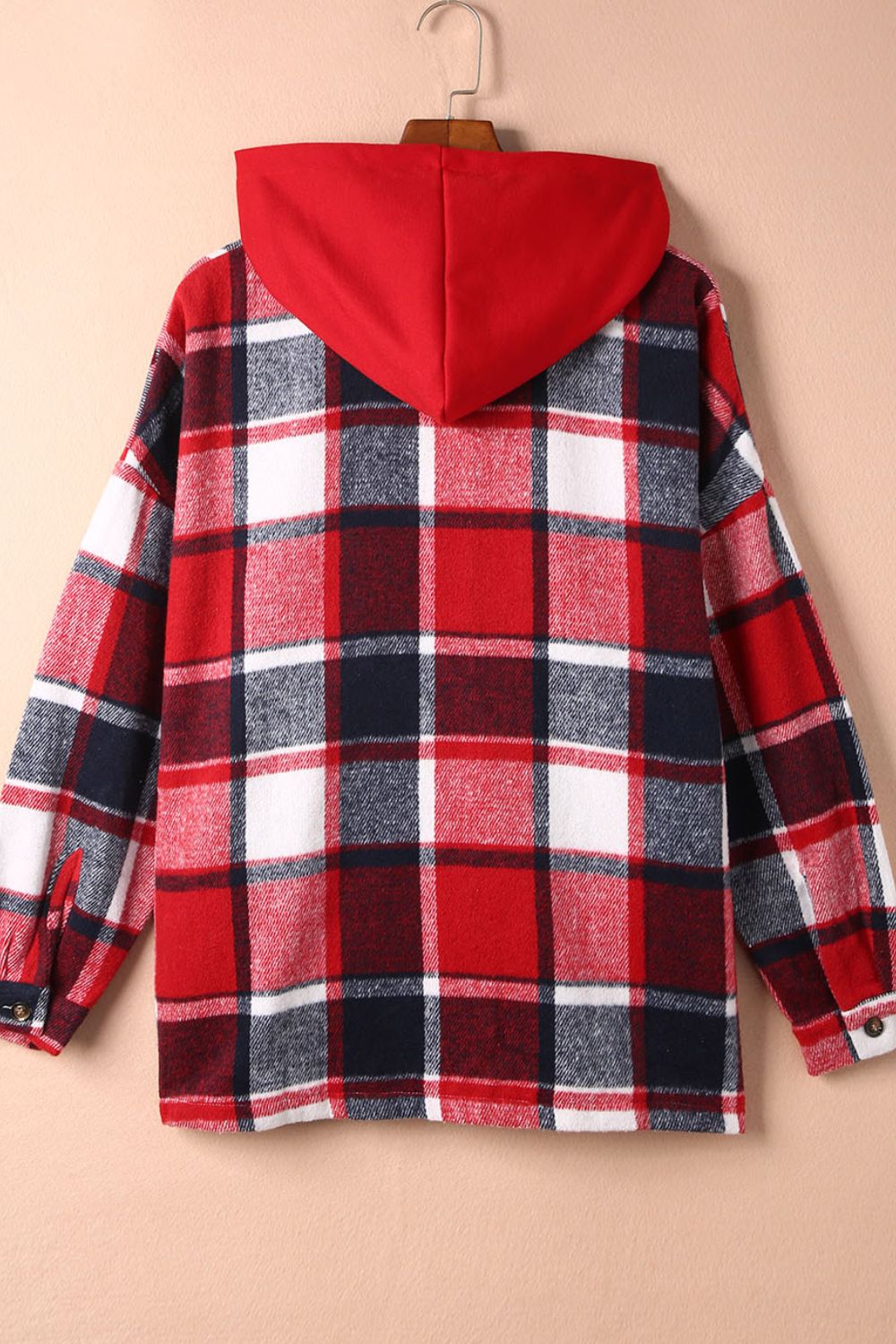 Plaid hooded shacket in red, white, and navy. Relaxed fit, casual outerwear.