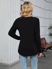 Black V-neck long sleeve maternity t-shirt with a curved hem.