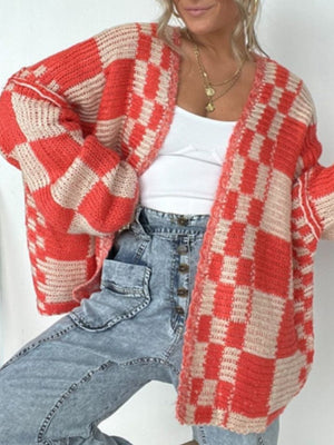 Oversized checkerboard knit cardigan in deep red and beige with a relaxed fit and open front.