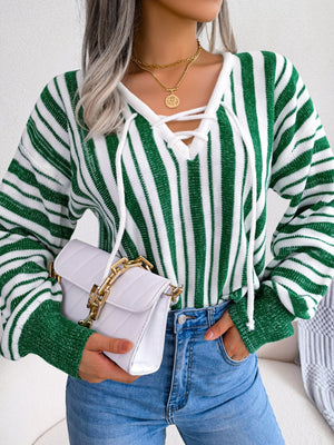 Green and white striped knit cropped pullover sweater with lace-up neckline.
