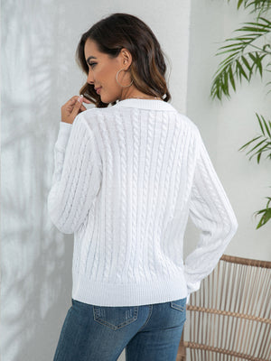 White cable knit polo neck jumper with long sleeves and a classic fit.
