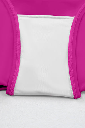 Sculpted tankini bottom in cerise with white lining and pink stitching detail.