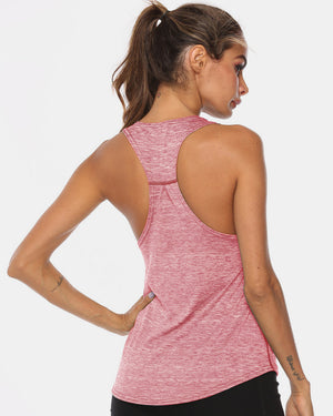 Racerback performance tank top in heathered blush pink with a curved hem.
