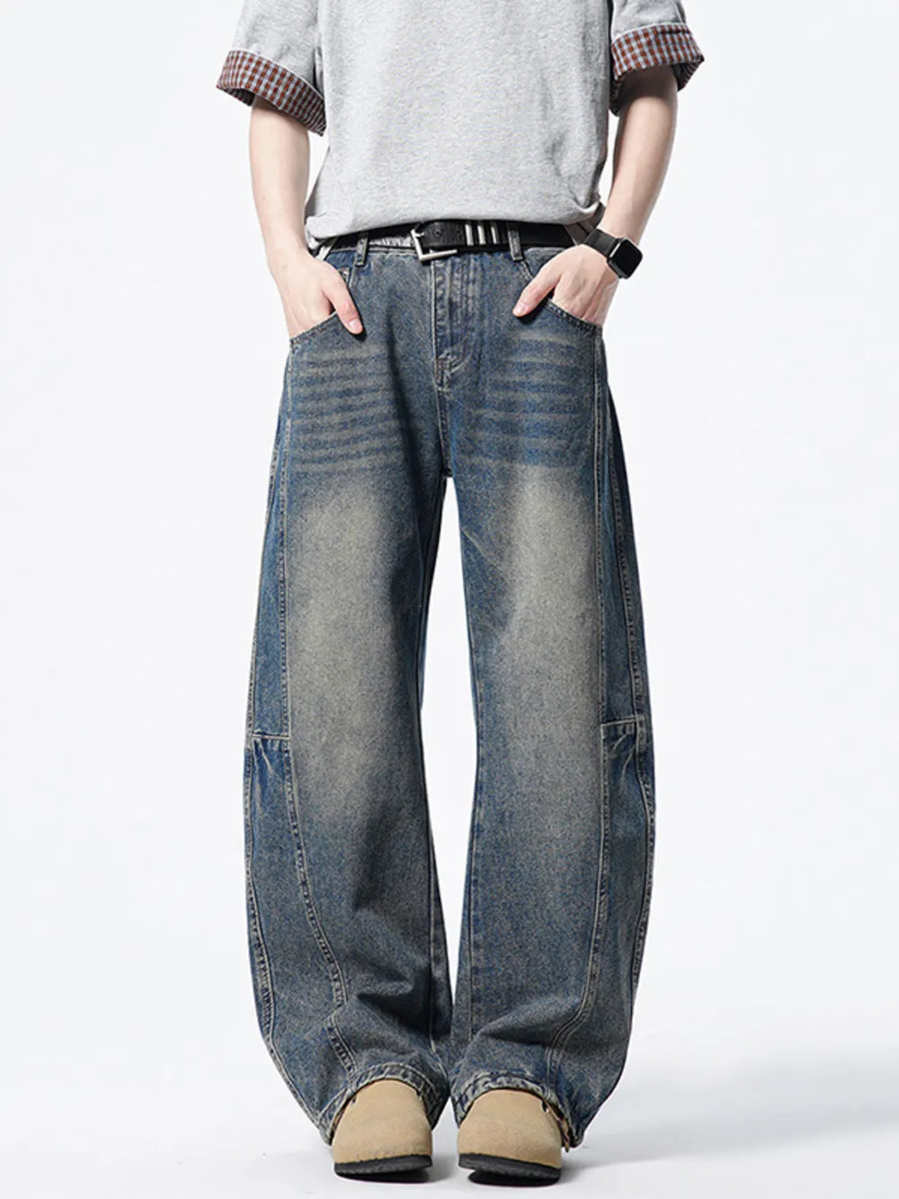 Men's dark wash wide-leg denim jeans with vintage fade and relaxed fit.