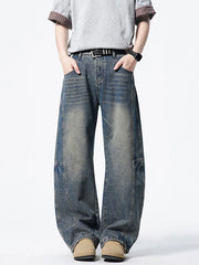 Men's dark wash wide-leg denim jeans with vintage fade and relaxed fit.