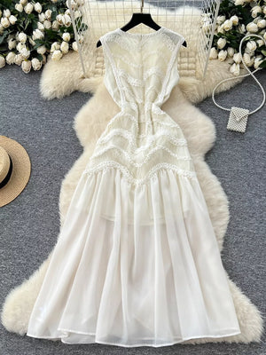White tiered lace midi maternity dress with V-neck and bow detail