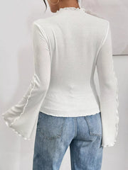 White lettuce edge flare sleeve t-shirt with lettuce edge detail on sleeves and neckline.