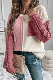 Textured panel sweater in dusty pink and cream with cable knit sleeves and chest pocket.