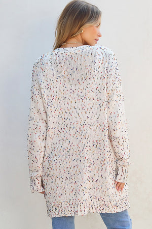 Confetti knit open-front cardigan in ivory with colorful speckles.