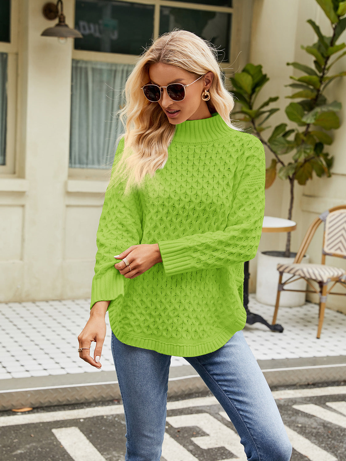 Lime green textured diamond knit turtleneck sweater with a relaxed fit.