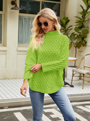 Lime green textured diamond knit turtleneck sweater with a relaxed fit.