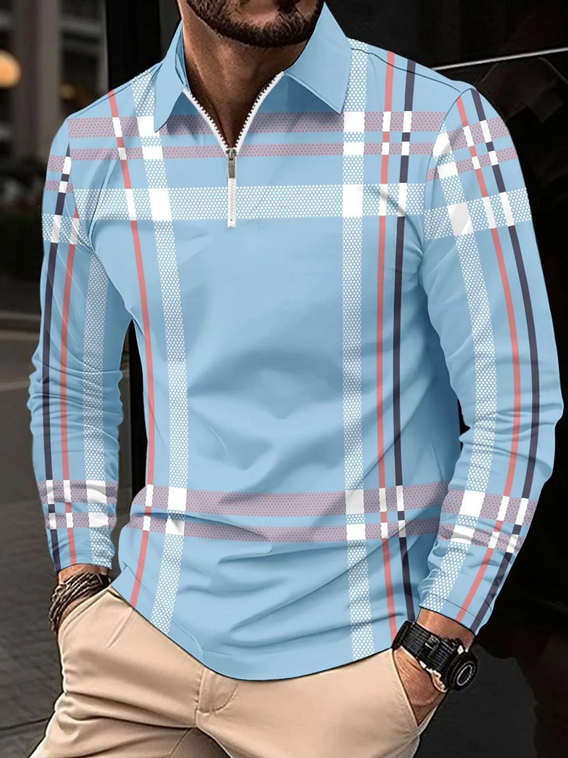 Light Blue graphic plaid zip polo shirt with long sleeves and collar.