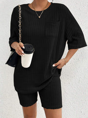 Black ribbed loungewear set with short sleeves, crew neck, and chest pocket.