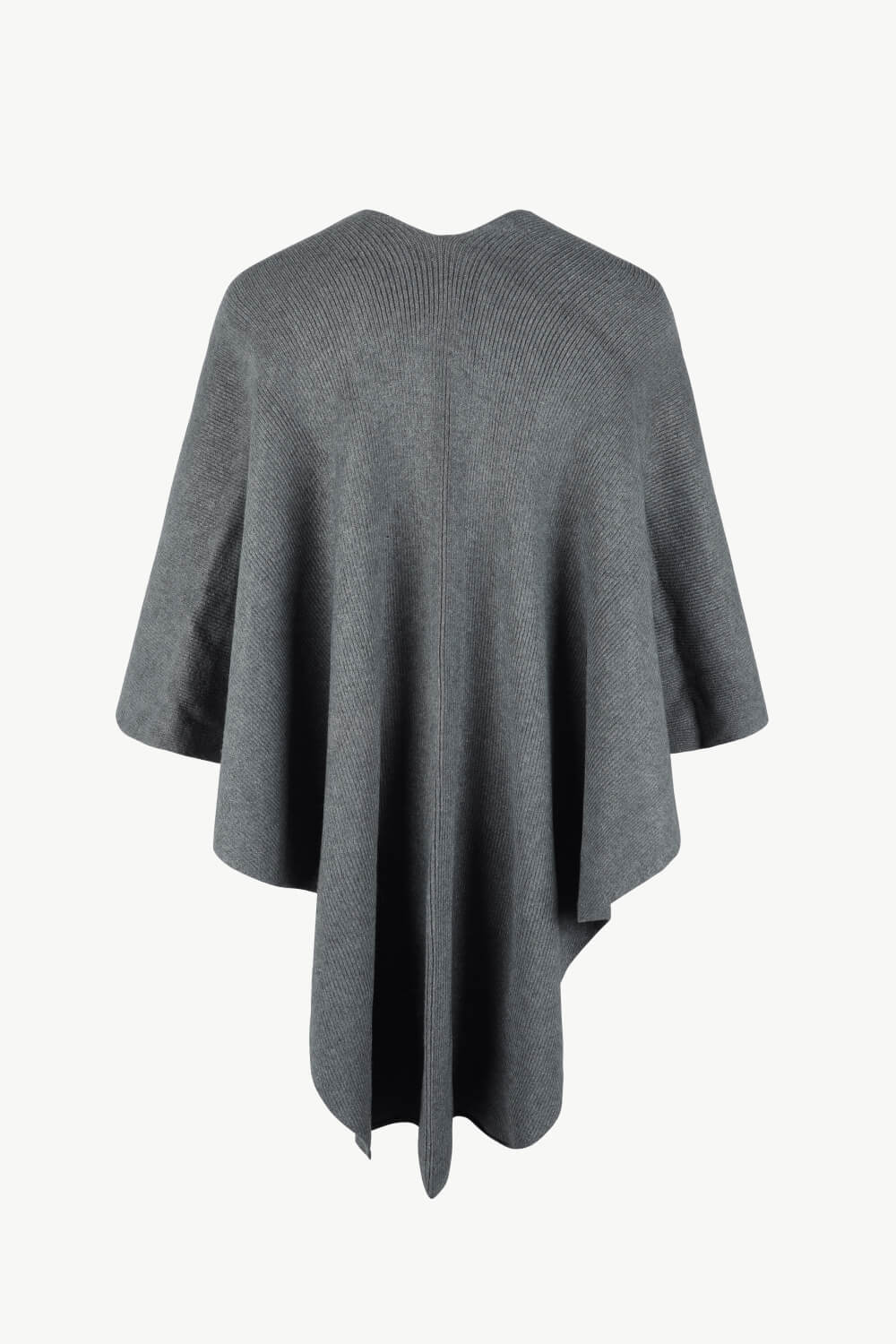 Charcoal knit cape with ribbed texture and a draped silhouette.