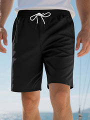 Black chino shorts with drawstring waist and zip pocket detail