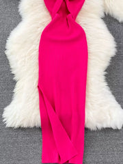 Rose Red ribbed knit midi dress with a high slit and knot-back detail.