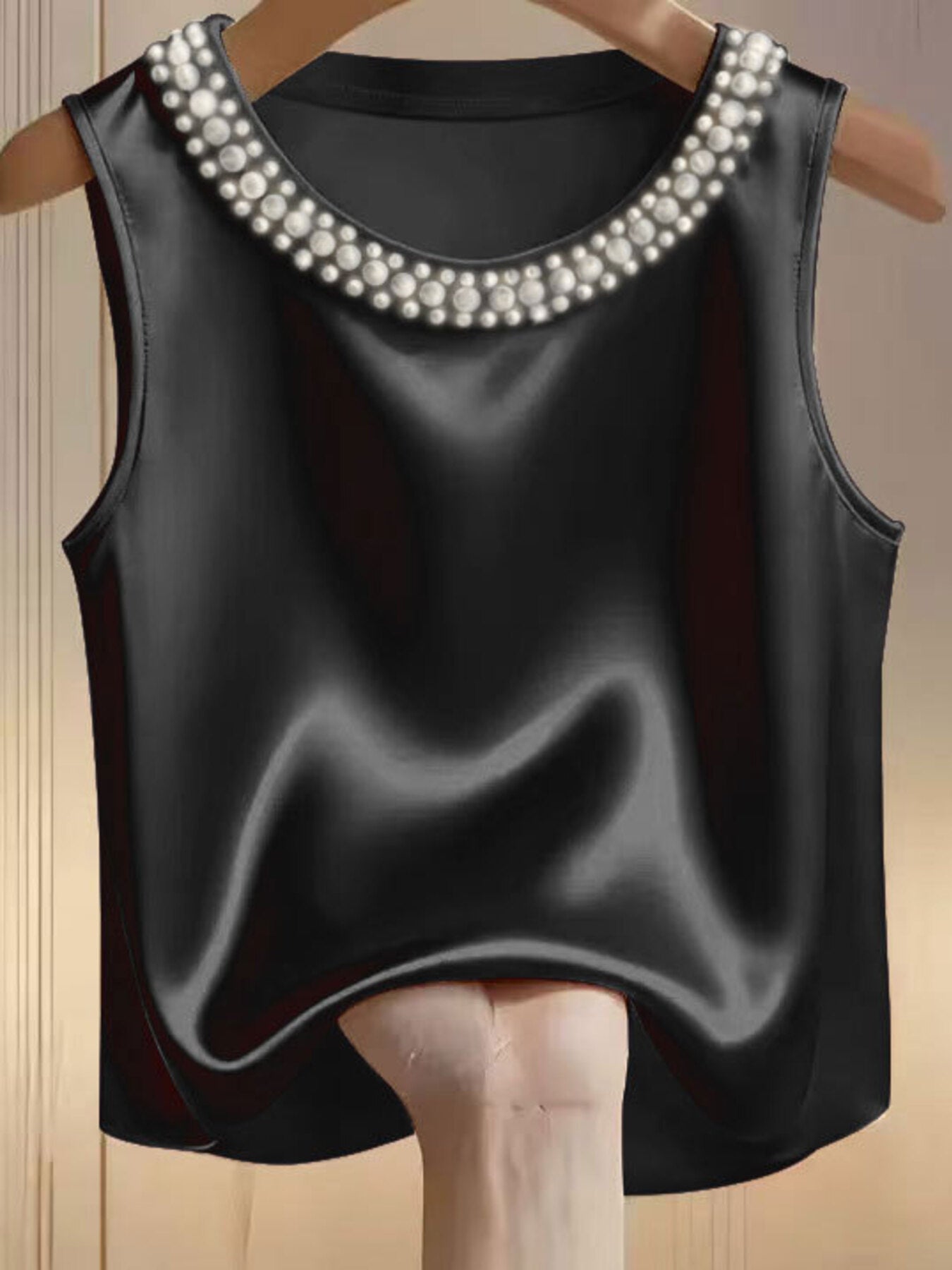 Black satin tank top with pearl embellished neckline