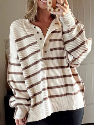 Casual beige striped knit henley sweater with button detail and contrast stitching.
