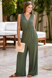 Sleeveless jersey palazzo jumpsuit in matcha green with a V-neck and elastic waist.