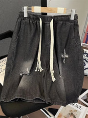 Black distressed denim shorts for men with drawstring waist and frayed details.