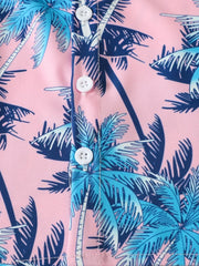 Pink cotton baby shirt with blue palm tree print and white buttons