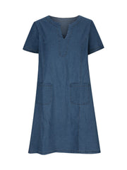 Dusty blue denim trapeze dress with V-neck and two front pockets.