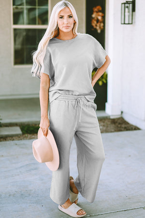 Light gray textured knit tee and wide leg pants set with drawstring waist