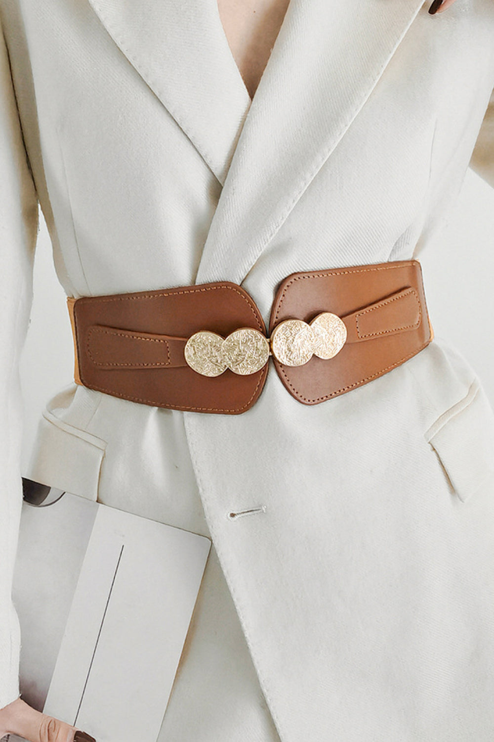 Caramel elastic waist belt with embossed gold clasp detail