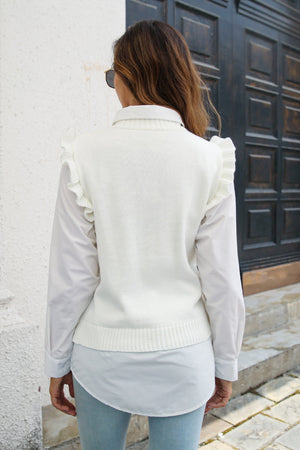 White diamond knit ruffle vest top with a mock neck, styled over a white collared shirt.